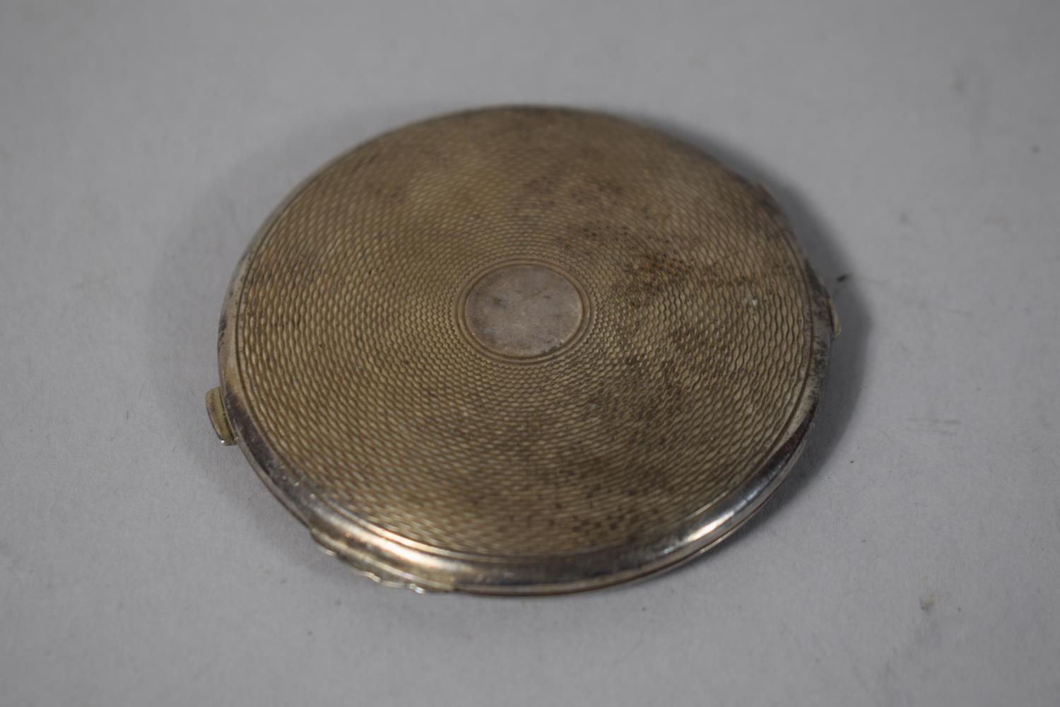 A Circular Silver Powder Compact with Engine Turned Decoration, B'Ham 1913, 6cms Diameter