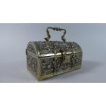 A Mid 20th Century Velvet Lined Dome Topped Casket Decorated in Relief and with Carrying Handle,