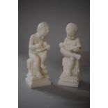 Two Resin Studies of Cherubs Reading and Writing, 19cms High