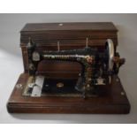 A Vintage Cased Bradbury Manual Sewing Machine