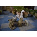 A Pair of Reconstituted Stone Patio Ornaments in the Form of Geese (58cms High), a Cat, a Temple Dog