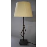 A David Hunt Lighting Ltd Ottoman Bronze Effect Resin Lamp with the Support in the Form of a