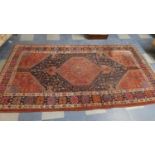 A Vintage Patterned Woollen Rug, 287 x 150cms