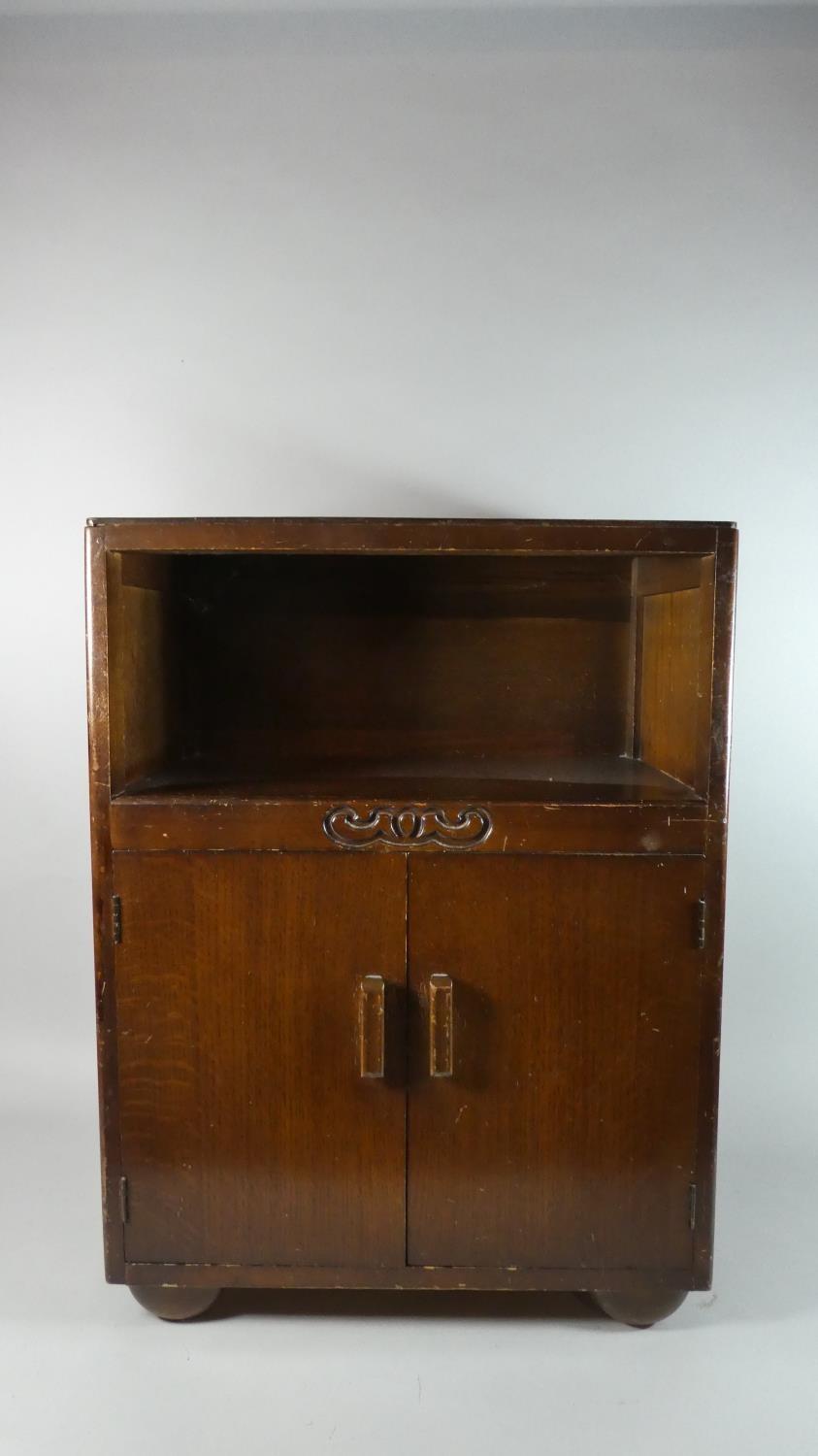 A Small Oak Side Cabinet, 54cms Wide