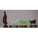 Three Oriental Jade Effect Glass Studies of Horses on Wooden Stands Together with a Carved Figure of