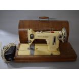 Two Frister & Rossmann Electric Sewing Machines but with Only One Foot Pedal