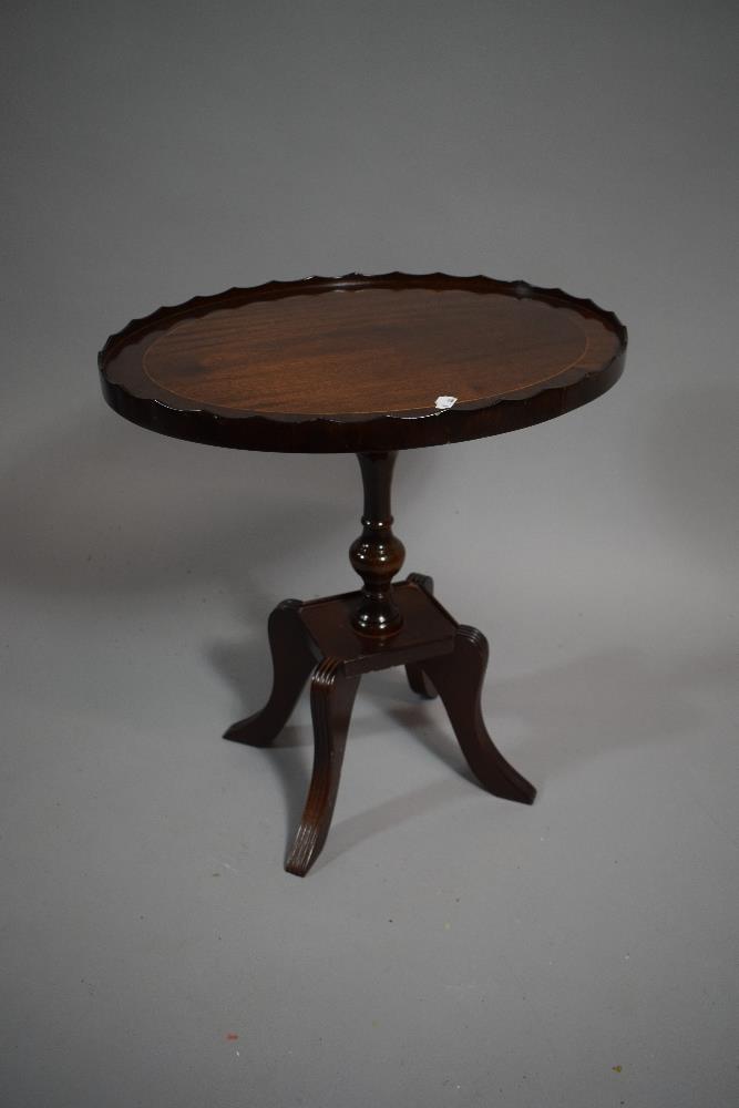 A Reproduction Oval Mahogany Galleried Wine Table