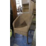 A Gold Sprayed Lloyd Loom Armchair