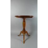 A Modern Circular Top Tripod Wine Table, 42cms Diameter and 56cms High