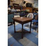 An Oak Square Topped Games/Tea Table with Removable Tray/Beize Top, Turned Legs and Cross Stretcher