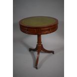 A Reproduction Mahogany Drum Table with Tooled Leather Top and Tripod Support, 50cms Diameter