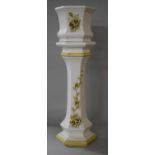 An Italian Jardiniere on Stand with Floral Decoration in Relief, 89cms High