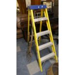 An Elex Step Ladder and a Garden Fork and Spade