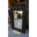 A Rectangular Oak Framed Mirror, 83 x 53cms