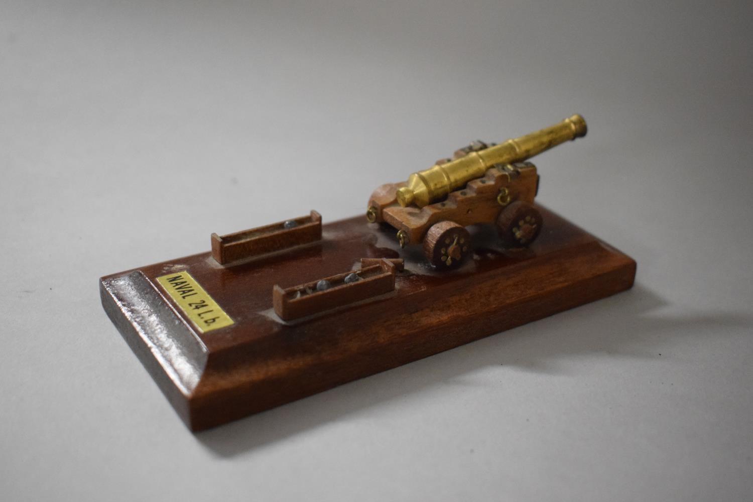 A Small Military Ink Bottle Stand Depicting Naval 24lb Cannon, Missing Ink Bottle, 13cms Long