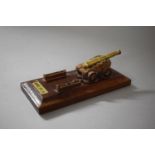 A Small Military Ink Bottle Stand Depicting Naval 24lb Cannon, Missing Ink Bottle, 13cms Long