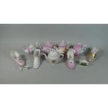 A Tray Containing Pink Lustre and Glazed Souvenir Teapots, Ladies Boots Etc.