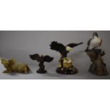 A Collection of Four Animal Resin Ornaments to Include Bronzed Eagle, Hawk and Pig