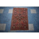 An Antique Persian Hand-Made Sarugh Rug, 128 x 78cms