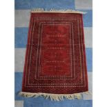 A Woven Silk Rug, 109 x 70cms