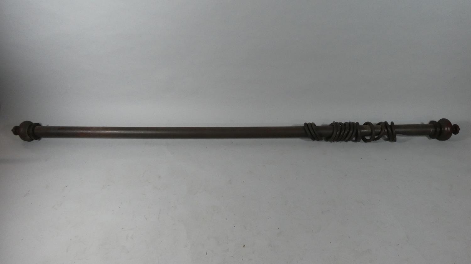 A Victorian Mahogany Curtain Pole with 14 Rings, 241cms