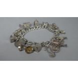 A Silver Charm Bracelet, 49.6gms