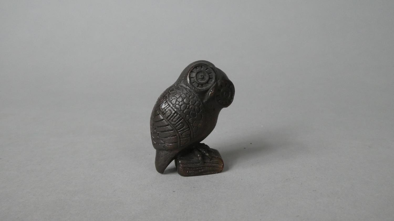 A Small Bronze Study of an Owl, 4cm high