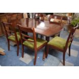 A Modern Mahogany Extending Dining Table and Six Chairs