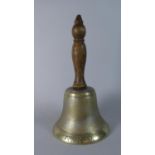 A Brass Hand Bell Stamped A.R.P, 25cms High