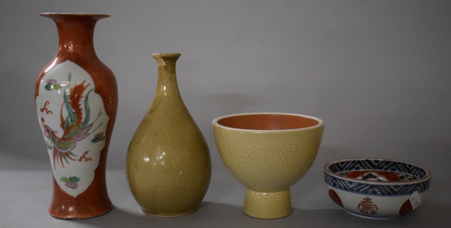 A Collection of Oriental Ceramics to Include Reproduction Stem Cup, Glazed Chinese Bottle, Phoenix