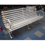 A White Painted Scroll Arm, Wrought Iron Garden Seat with Scrolled Supports, 185cms Wide