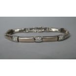 An 18 Carat White Gold and Diamond Chip Bracelet, Stamped 750 and the Clasp Inscribed "by Pablo",