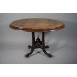 A Victorian Burr Walnut Oval Snap Top Table on Turned Reeded Supports, 103cms Wide