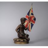 A Rare British Raj Radiator Cap Car Mascot in the Form of Seated and Cross Legged Indian Holding