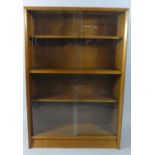 A Mid 20th Century Glazed Mahogany Bookcase with Sliding Doors, 76cms Wide