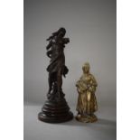 A French Spelter Figure, 'Messagerie Par Aug. Moreau' (af) 32cms High Together with a Cast Brass