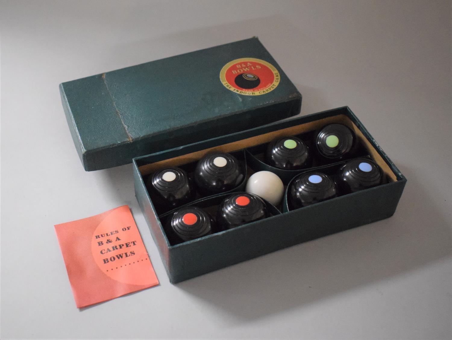 A Boxed Set of the Indoor Carpet Bowls by Brookes & Adams Ltd., Birmingham