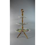 A Tall Three Tier Continental Ceramic Cake Stand, 67cms High