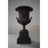 A 19th Century Cast Bronze Two Handled Urn with Flared Rim and Relief Decoration Depicting Pan