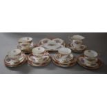 An Edwardian Floral Pattern Part Tea Set Comprising Four Trios, Sugar, Cream and Cake Plate Etc.