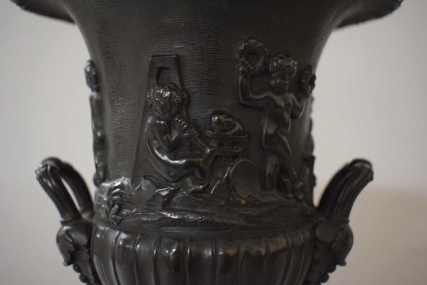 A 19th Century Cast Bronze Two Handled Urn with Flared Rim and Relief Decoration Depicting Pan - Image 2 of 5