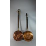 Two Copper Bed Warming Pans with Turned Wooden Handles