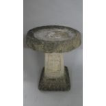 A Circular Topped Reconstituted Stone Birdbath, 39cms Diameter, 50cms High