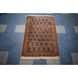 An Antique Persian Hand-Made Kashan Rug, 150 x 94cms