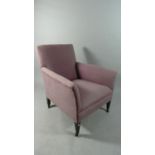 A Small Upholstered Armchair with Square Tapering Supports