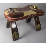 A Small Souvenir Leather Upholstered Camel Saddle Stool, 45cms Long