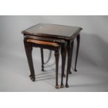 A Nest of Three Mahogany Tables, 54cms Wide