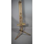 A Vintage Wooden Artist's Easel on Tripod Folding Stand