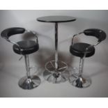 A Modern Chrome Based Tall Pub Table and Two Matching Stools