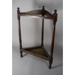 A Triangular Oak Stick Stand with Drip Tray, 43cms Wide